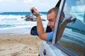 Traveler in the car on the background of the sea