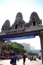 Traveler and Combodian people walking through the border to Cambodia