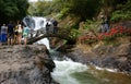 Traveler in ecotourism on vacation at waterfall