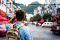 Traveler exploring Asian food market street Royalty Free Stock Photo