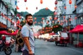 Traveler exploring Asian food market street Royalty Free Stock Photo