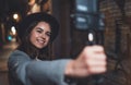 Traveler female blogger shooting video for shoot social media with digital camera. Smiling woman taking selfie vlog video on ligh