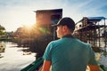 Traveler in the floating village Royalty Free Stock Photo