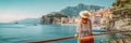 Traveler girl on iron bridge looking historic buildings in city centre of Italian old city. Royalty Free Stock Photo