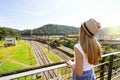 Traveler girl looking the old train station with clock tower of Paranapiacaba, Sao Paulo, Brazil Royalty Free Stock Photo