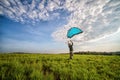 Traveler having camping with tent on field and wind blow tent away