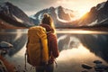 Traveler hiker camper woman wearing Big Trekking Backpack. Viewed from the back. Mountains landscape. Hiking, trekking