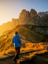 Traveler hiking breathtaking landscape of Dolomite