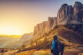 Traveler hiking breathtaking landscape of Dolomite