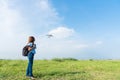 Traveler hiking photographer woman has happy and relax on vacation with blue sky and plane in the morning.