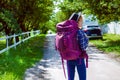 Traveler Holding Hicking Bag On The Road