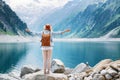 Traveler-Image. Traveler look at the mountain lake. Travel and active life concept. Royalty Free Stock Photo