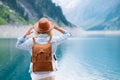 Traveler-Image. Traveler look at the mountain lake. Travel and active life concept. Royalty Free Stock Photo