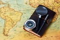 Traveler items on map background with copy space, close-up Royalty Free Stock Photo