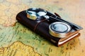 Traveler items on map background with copy space, close-up Royalty Free Stock Photo