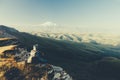 Traveler looking to Elbrus mountain Royalty Free Stock Photo