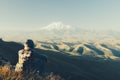 Traveler looking to Elbrus mountain Royalty Free Stock Photo