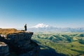 Traveler looking to Elbrus mountain Royalty Free Stock Photo