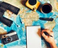 Traveler makes a trip plan. camping gear, top view Royalty Free Stock Photo