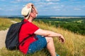 Traveler male relaxing meditation with serene view mountains landscape summer day.Relaxing middle age man.closeup Royalty Free Stock Photo