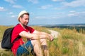 Traveler male relaxing meditation with serene view mountains landscape summer day.Relaxing middle age man.closeup Royalty Free Stock Photo