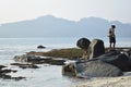 Traveler Man with backpack. Beautiful on the top and bottom of the Coral Sea