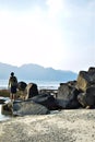 Traveler Man with backpack. Beautiful on the top and bottom of the Coral Sea