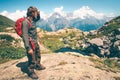 Traveler Man with backpack looking at mountains