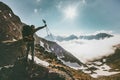 Traveler Man with backpack on mountain summit Royalty Free Stock Photo