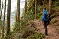 Traveler Man with backpack mountaineering Travel Lifestyle concept mountains on background Summer trip vacations outdoor Royalty Free Stock Photo