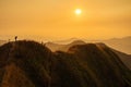 Traveler man hiking enjoying in the mountains with backpack at Khao Chang Puak mountain Thailand Royalty Free Stock Photo