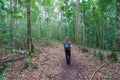 Traveler man hiking enjoying in the mountains with backpack at Khao Chang Puak mountain Thailand Royalty Free Stock Photo