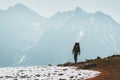 Traveler Man hiking in mountains Lifestyle travel survival concept