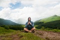 Traveler man relaxing meditation with serene view mountains Royalty Free Stock Photo