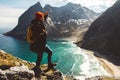 Traveler man stand on cliff edge alone enjoying aerial view backpacking lifestyle travel adventure outdoor vacations. Place for Royalty Free Stock Photo