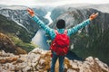 Traveler Man on the top of mountain success raised hands Royalty Free Stock Photo