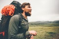 Traveler Man wayfaring in foggy mountains Royalty Free Stock Photo