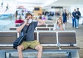 Traveler with mask stuck in airport no able to return home country due to COVID-19 border closures Royalty Free Stock Photo