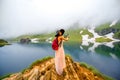 Traveler on the mountain lake Royalty Free Stock Photo