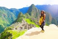 Traveler with panoramic view of Machupicchu world heritage site at Cusco Peru Royalty Free Stock Photo