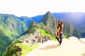 Traveler with panoramic view of Machupicchu world heritage site at Cusco Peru Royalty Free Stock Photo