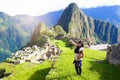 Traveler with panoramic view of Machupicchu world heritage site at Cusco Peru Royalty Free Stock Photo
