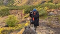 A traveler photographer takes a photo of the amazing nature of Kamchatka