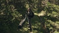 Traveler photographing scenic view in forest. One caucasian woman shooting nice magic look. Girl take photo video on Royalty Free Stock Photo