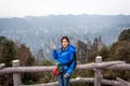 Traveler post for picture took at Zhangjiajie national park, Hunan province, China. Royalty Free Stock Photo