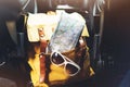 Traveler relax holiday concept, view planning way road in trip vacation, hipster hiker tourist yellow backpack closeup
