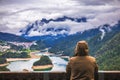 Traveler relaxing meditation with serene view mountains and lake