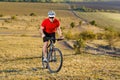 Traveler ride a bike on autumn background