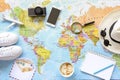 Traveler`s accessories and items with copy space on world map background, travel by airplane concept. Royalty Free Stock Photo