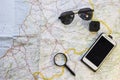 Traveler's items on a map Royalty Free Stock Photo